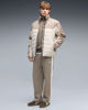 Immagine di PUMA - PANTALONE DA ALLENAMENTO T7 ALWAYS ON RELAXED GRIGIO CON DETTAGLI BIANCHI DA UOMO, 629589-81