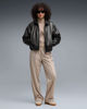 Immagine di PUMA -PANTALONI DRITTI T7 CON STAMPA SERPENTE BEIGE DA DONNA,  638733-81