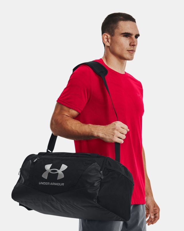 UNDER ARMOR - Borsone nero impermeabile con tasca frontale e logo bianco